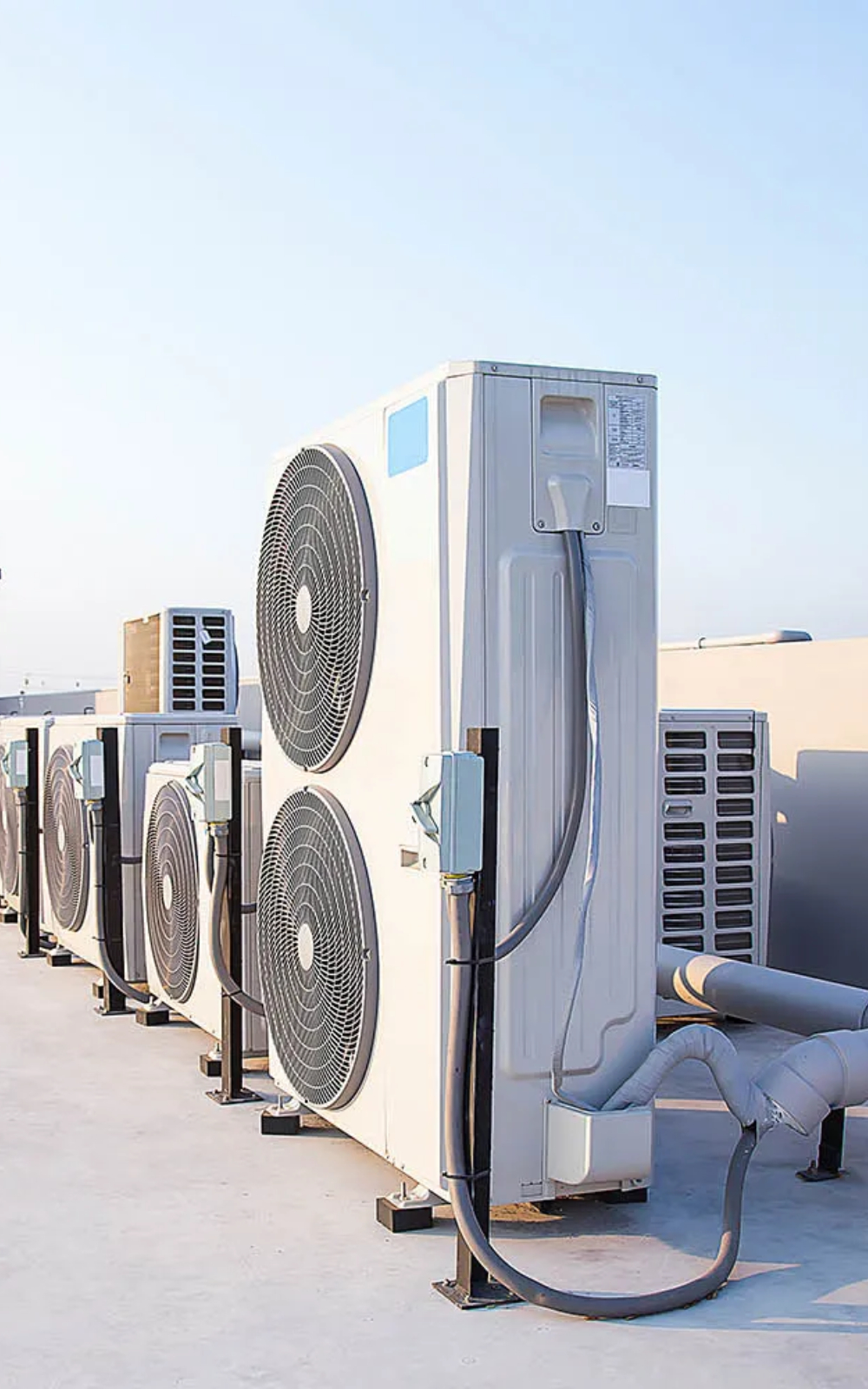 Commercial rooftop air conditioning units at an industrial building